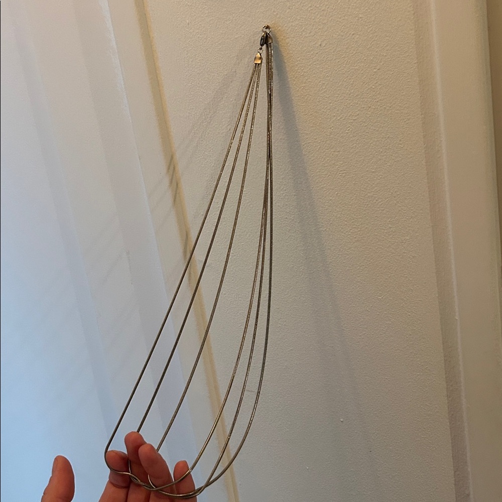 Elegant Silver Three-Tiered Snake Chain Necklace